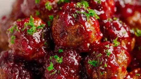 Christmas Cranberry Meatballs served on a festive platter