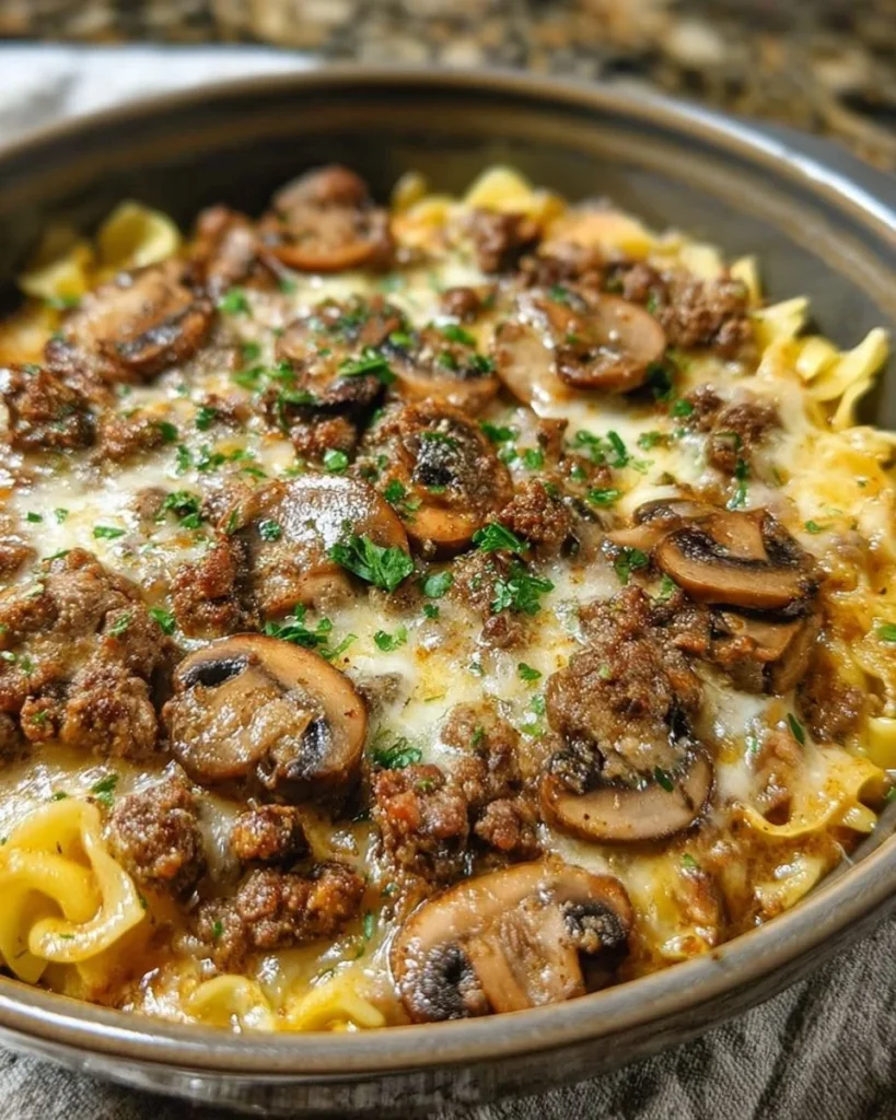 Creamy beef casserole with vegetables and cheese, perfect for a hearty meal.