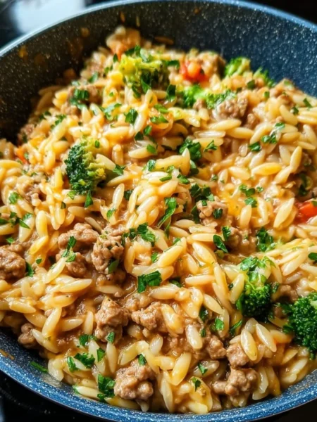 One-Pot Ground Turkey Orzo dish in a skillet with fresh vegetables