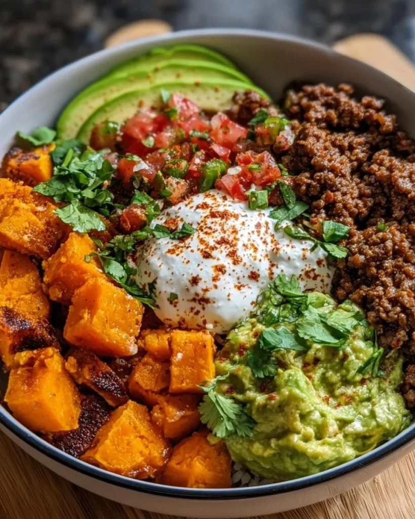 Delicious sweet potato taco bowl with fresh toppings and vibrant ingredients