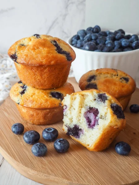Healthy cottage cheese blueberry muffins on a wooden table